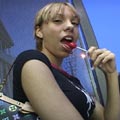 Babe licking a lollipop